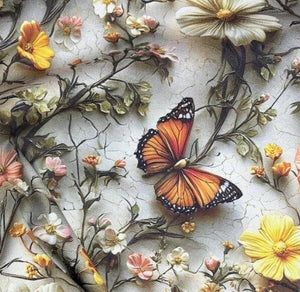 Close up of 3d print wildflower and butterfly patterned upholstery curtain fabric.