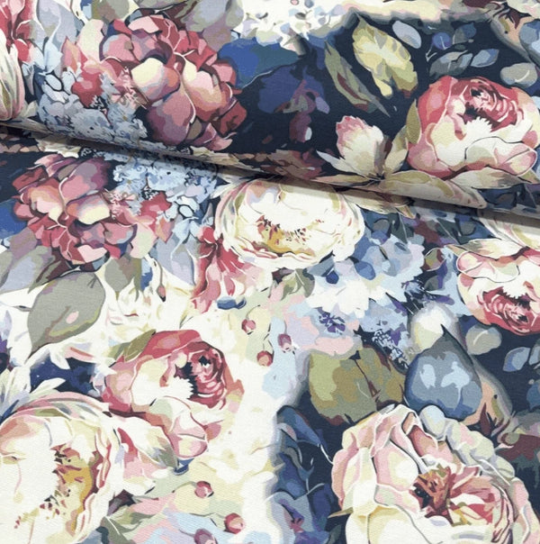 Floral fabric with a mix of colors including pink, blue, yellow, green and white.