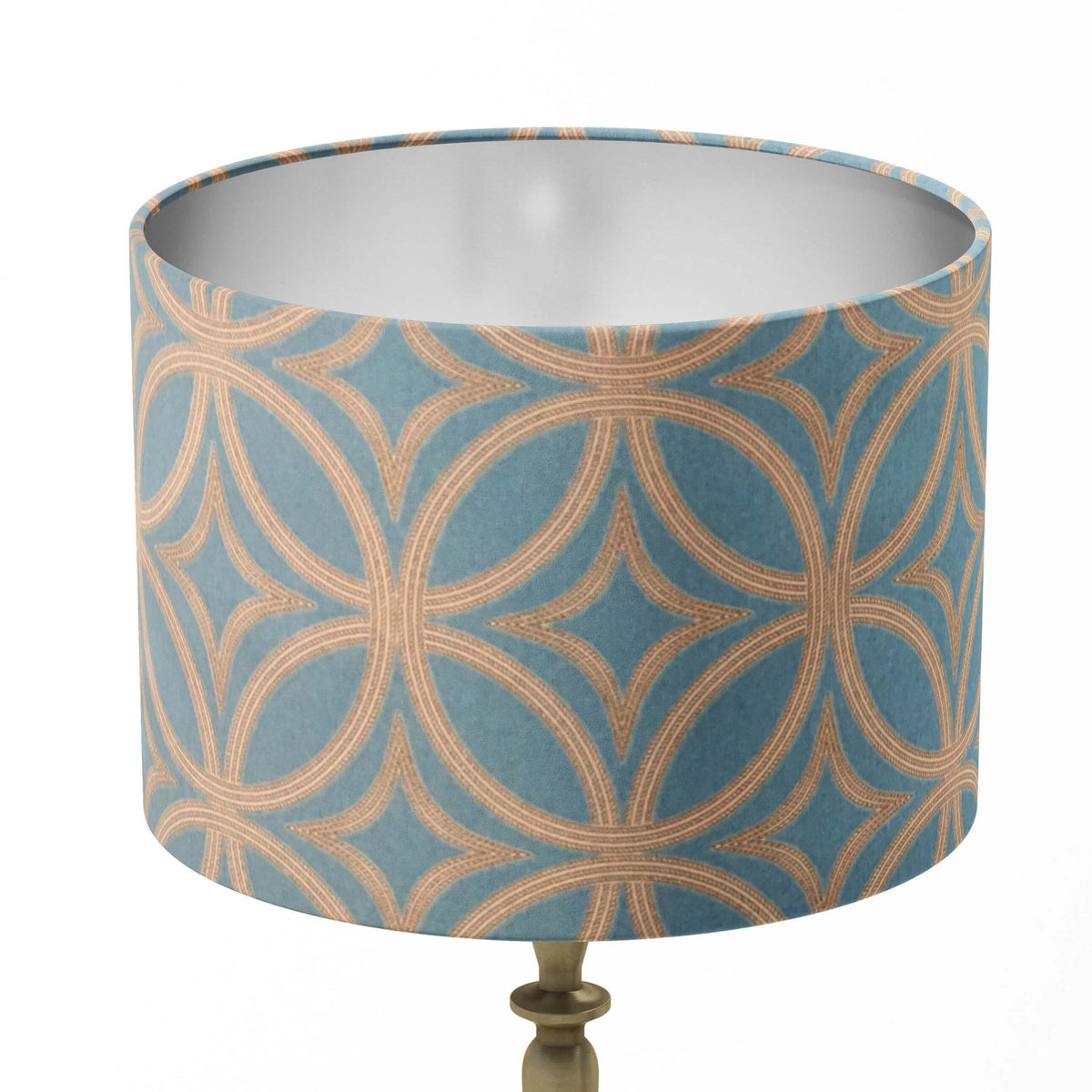 Decorative table lampshade with art deco pattern on a white background.