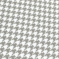 Light brown and white dogtooth print cotton canvas upholstery fabric.