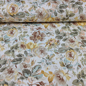 Beige and brown floral patterned upholstery fabric with a focus on yellow roses and sage green leaves.