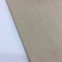 Neutral beige cotton duck canvas upholstery fabric ideal for curtains, Roman blinds, cushions, bags, and home furnishing projects.