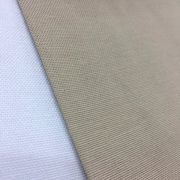 Neutral beige cotton duck canvas upholstery fabric ideal for curtains, Roman blinds, cushions, bags, and home furnishing projects.