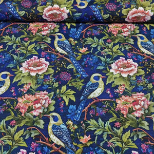 Night blue goldfinch bird, pink peony flower and green leaves patterned floral tapestry upholstery fabric.