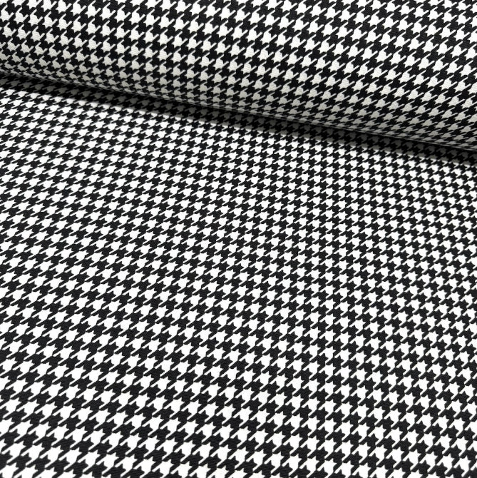 Black and white houndstooth dogtooth pattern fabric for upholstery curtain and home decor.