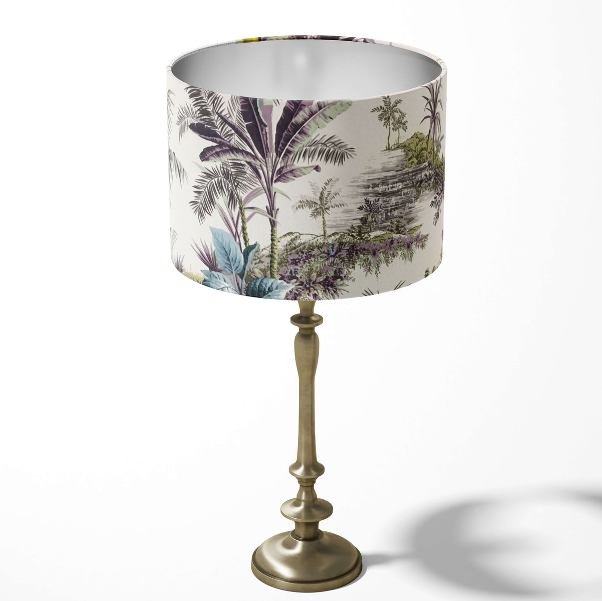 Table lampshade with a tropical exotic palm trees pattern in green and blue on a white background.