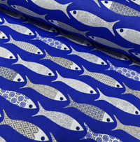 Grey and blue fish print fabric on a royal blue background.