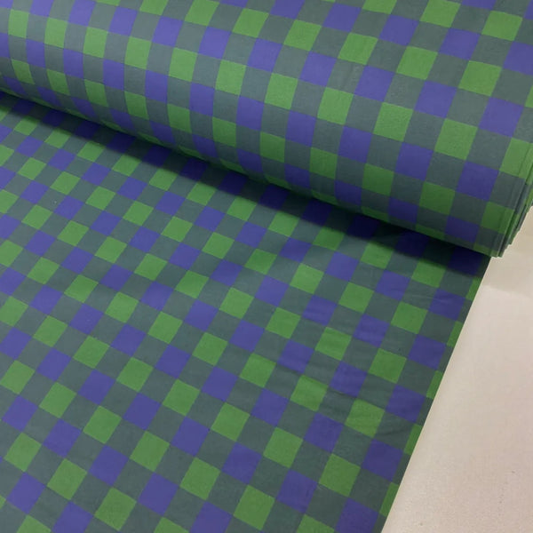 Blue and green check cotton fabric with a modern buffalo plaid pattern ideal for dressmaking, quilting and craft projects.