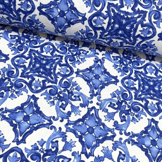 Blue and white floral patterned majolica upholstery curtain fabric.