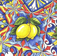 Colourful sicilian tile pattern fabric with lemons and geometric shapes.