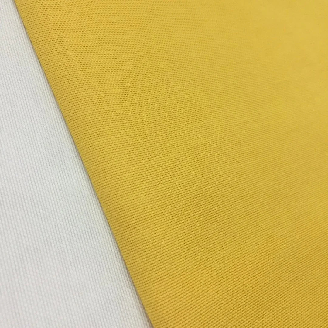 Bright yellow cotton canvas fabric with a plain texture, suitable for upholstery, curtains, cushions, bags, crafts, and light outdoor furnishing projects.