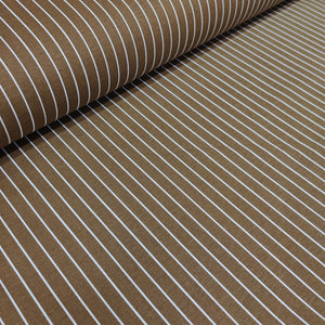 Brown cotton curtain fabric with white stripes, partially rolled up