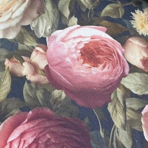 Close-up of burgundy roses and sage green leaves fabric.