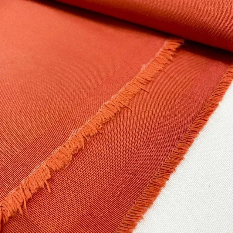 Burnt orange plain water-repellent canvas fabric for outdoor, upholstery, garden furniture, cushions, chairs and home décor projects.