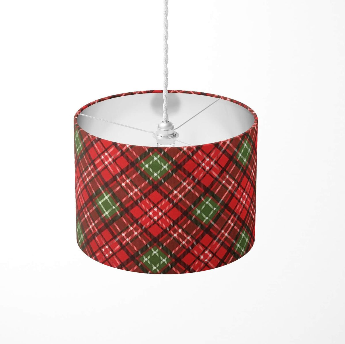 Red and green plaid tartan ceiling lampshade on a white background.