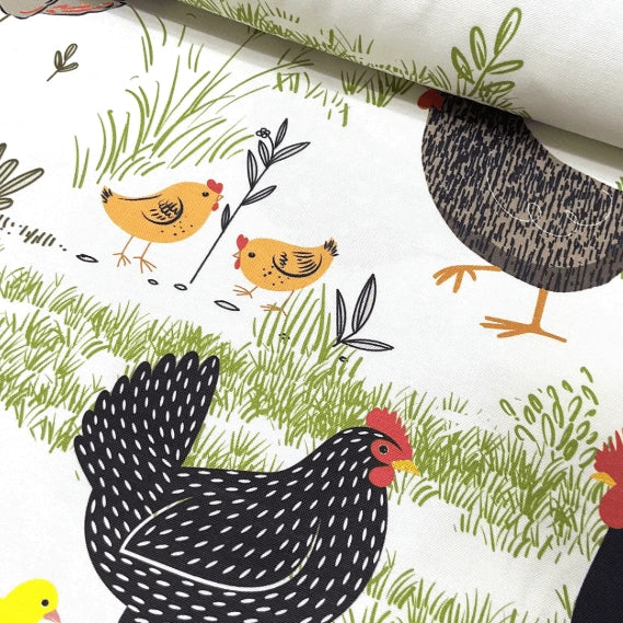 Upholstery fabric with chicken, hen, rooster and chick pattern on a white background. 