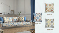 Decorative pillows in blue, yellow and grey with geometric patterns on a sofa in a living room.
