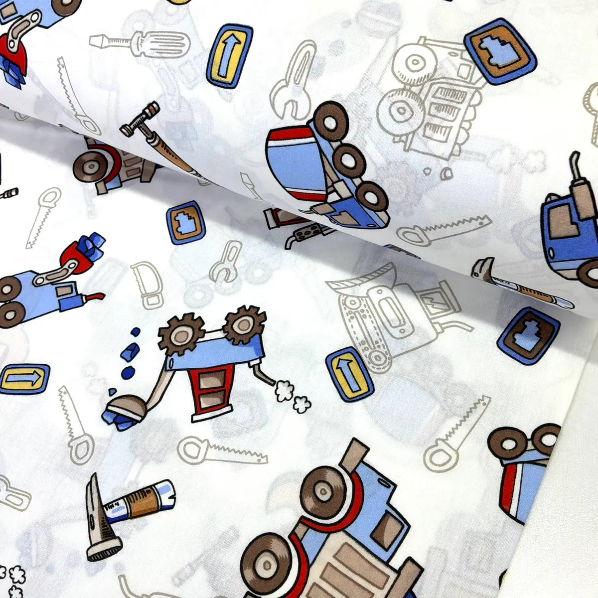 Construction vehicles and tools cotton fabric featuring diggers, dump trucks, excavators, workshop tools and road signs on a white background.