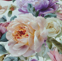 Close-up of a floral pattern with pink, purple, and white flowers.