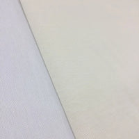 Cream cotton canvas soft furnishing fabric ideal for upholstery, curtains, roman blinds, cushions, bags, and home décor projects.