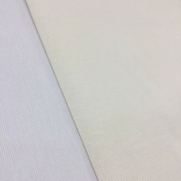 Cream cotton canvas soft furnishing fabric ideal for upholstery, curtains, roman blinds, cushions, bags, and home décor projects.