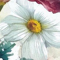 Close-up of white yellow daisy patterned fabric.