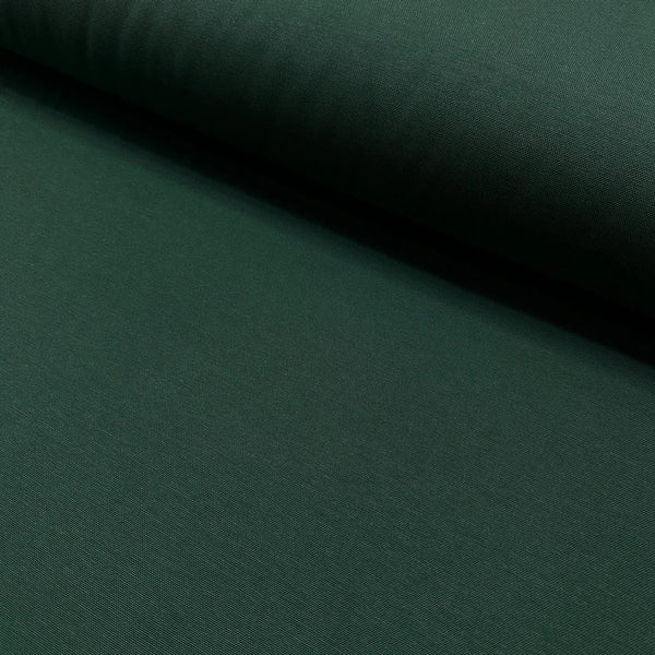 Dark forest green cotton canvas fabric with a plain woven texture, suitable for upholstery, curtains, cushions, bags, crafts, and soft furnishing projects.
