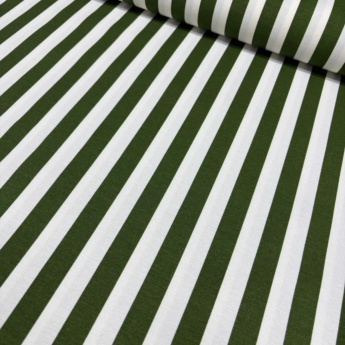 Dark forest green and white stripe patterned cotton canvas upholstery curtain fabric.