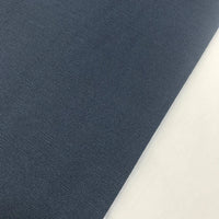 Denim blue cotton canvas fabric ideal for upholstery, curtains, cushion covers, chairs, bags and home décor projects.
