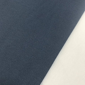 Denim blue cotton canvas fabric ideal for upholstery, curtains, cushion covers, chairs, bags and home décor projects.