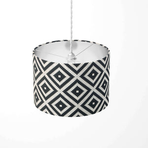 Pendant lampshade with black and white monochrome diamond pattern on a white background.
