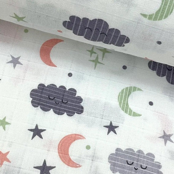 Double gauze cotton muslin fabric with cloud, star, and moon patterns in coral red, grey and sage green on a white background.