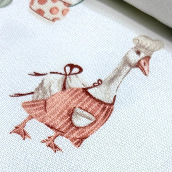 Close-up pf cartoon goose print fabric for kitchen windows, aprons, tablecloths and various crafts.