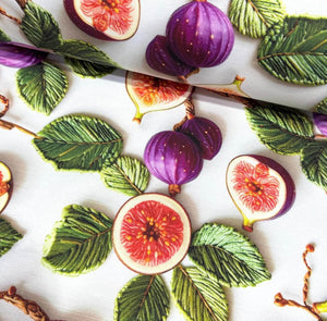 3d look upholstery curtain fabric with purple figs and green leaves patterned on a white background. 