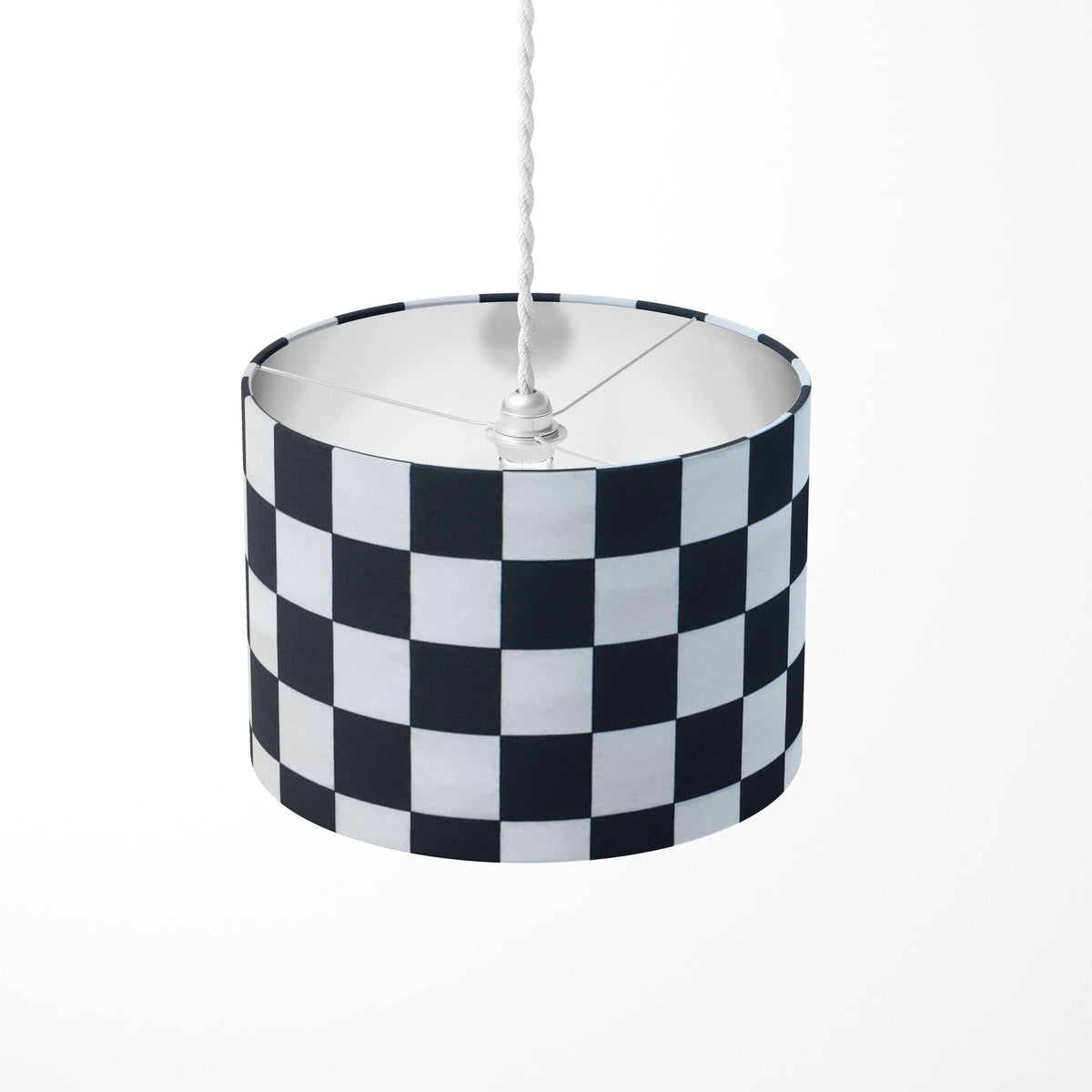 A black and white monochrome check pattern ceiling drum lampshade.