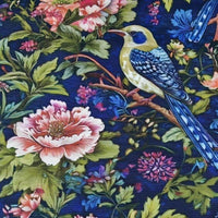 Blue goldfinch bird, pink peony flower and green leaves patterned upholstery curtain fabric.