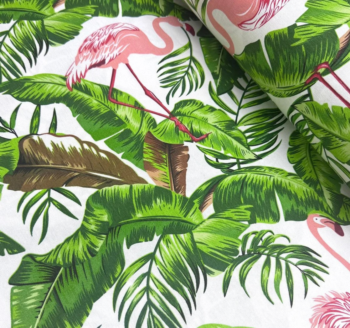 Green banana leaves and pink flamingo patterned upholstery & curtain fabric.