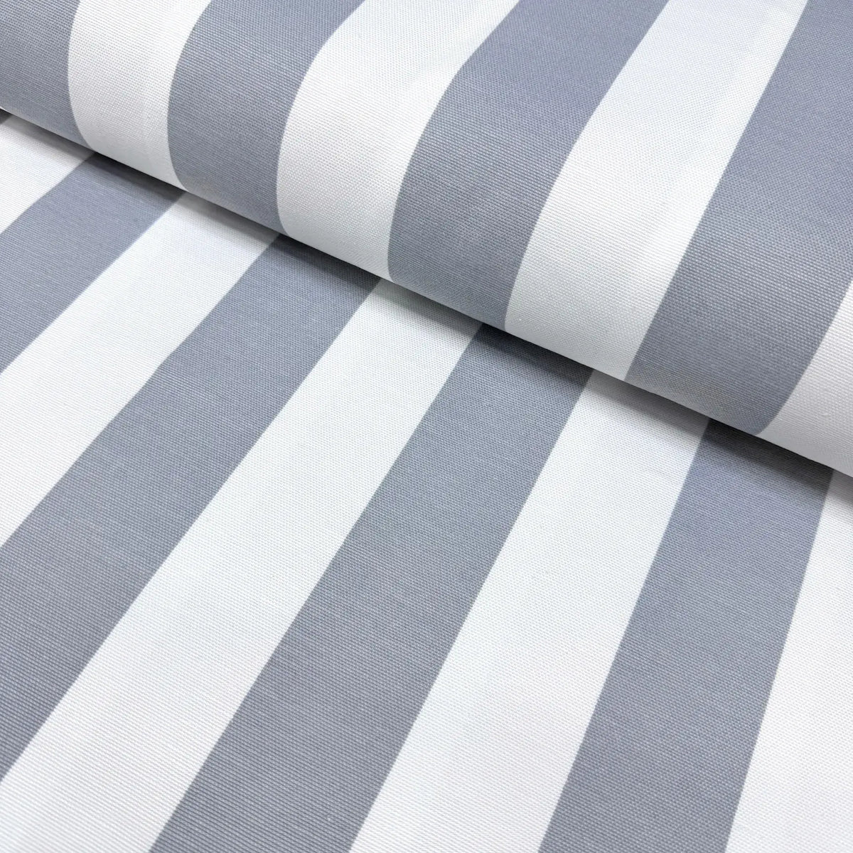 Silver grey and white big stripe patterned cotton canvas upholstery fabric.