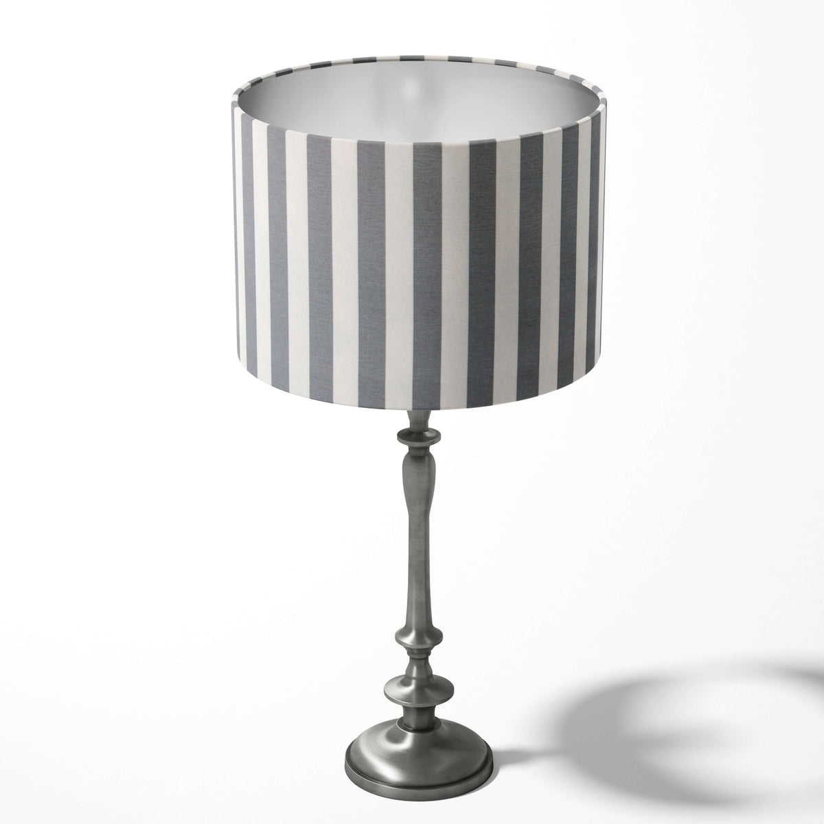 Table drum lampshade with a modern grey white striped pattern on a white background.