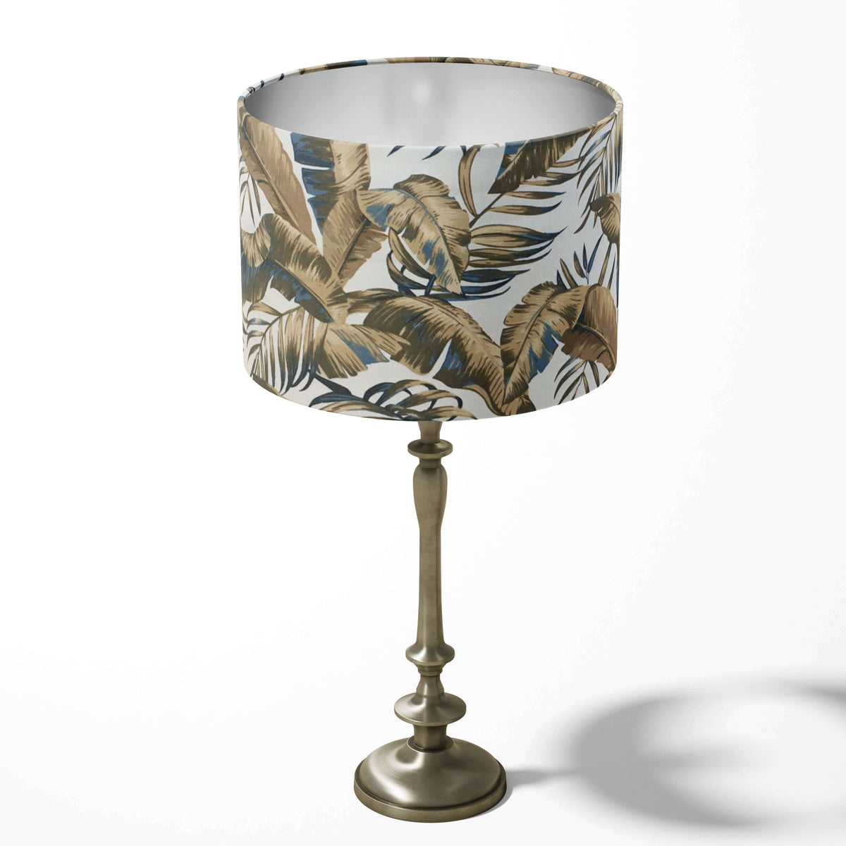 Table lampshade with an exotic hawaiian leaf-pattern on a white background.
