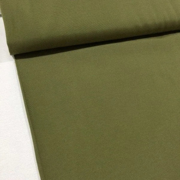 Khaki upholstery fabric in a plain olive green shade, perfect for upholstery, curtains, cushions, roman blinds and home décor projects.