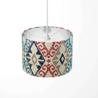 Tribal ceiling lampshade with geometric diamond pattern on a white background.