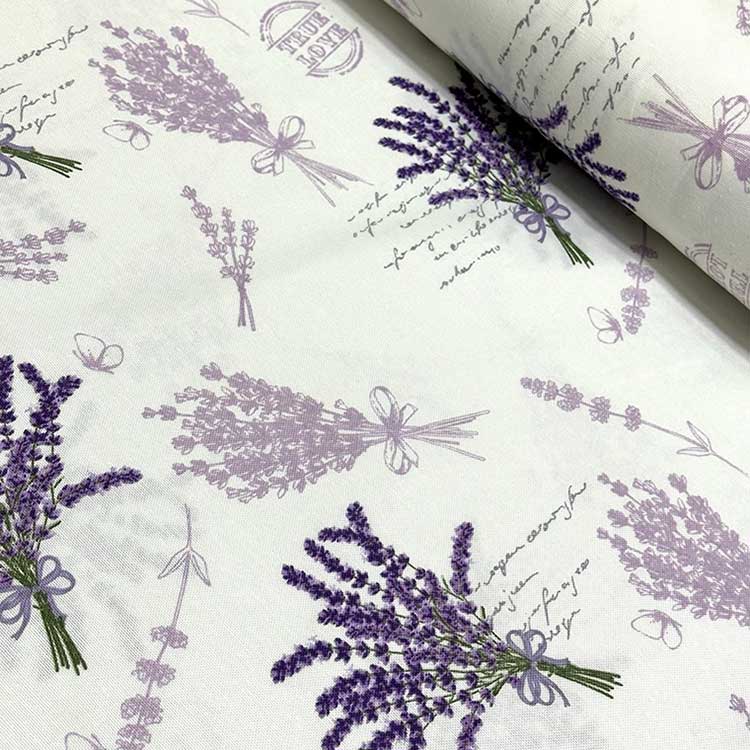 Lavender floral upholstery fabric patterned with purple lilac flowers on a white background.