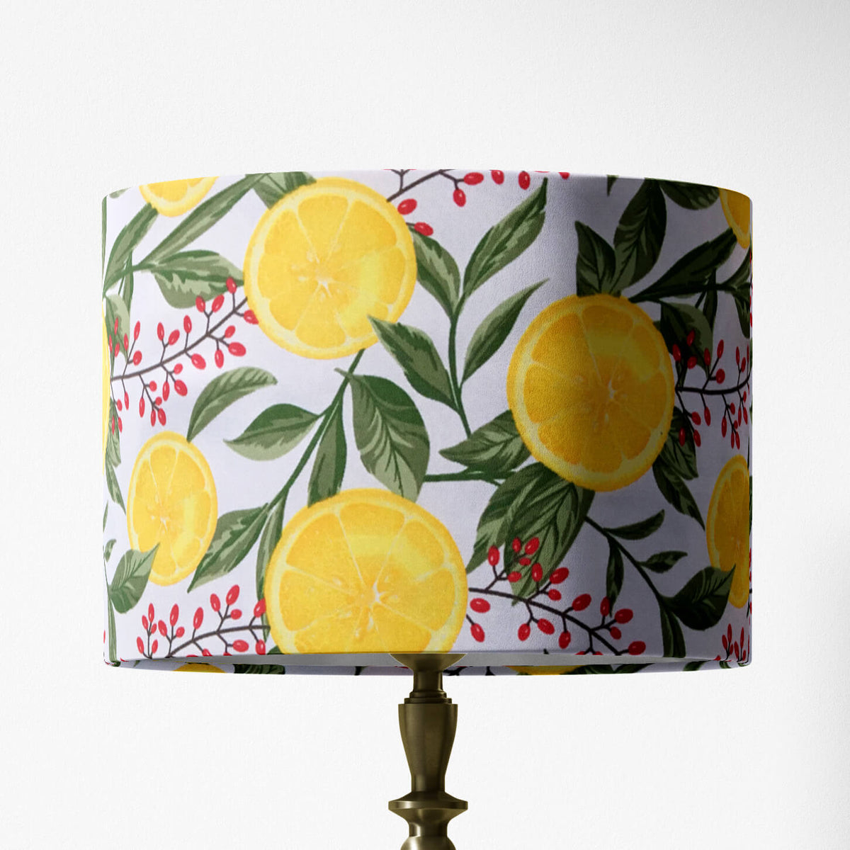 Table lampshade with lemon tree pattern on a white background.