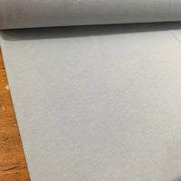 Light grey plain water-resistant outdoor upholstery fabric in a silver grey shade, suitable for curtains, garden furniture, cushions and chairs.