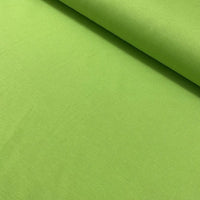 Bright lime green cotton canvas upholstery fabric ideal for curtains, cushions, drapes, upholstery and outdoor projects.