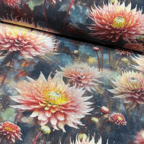 Boho large print lotus flower patterned upholstery fabric in pink yellow tones and dark background. 