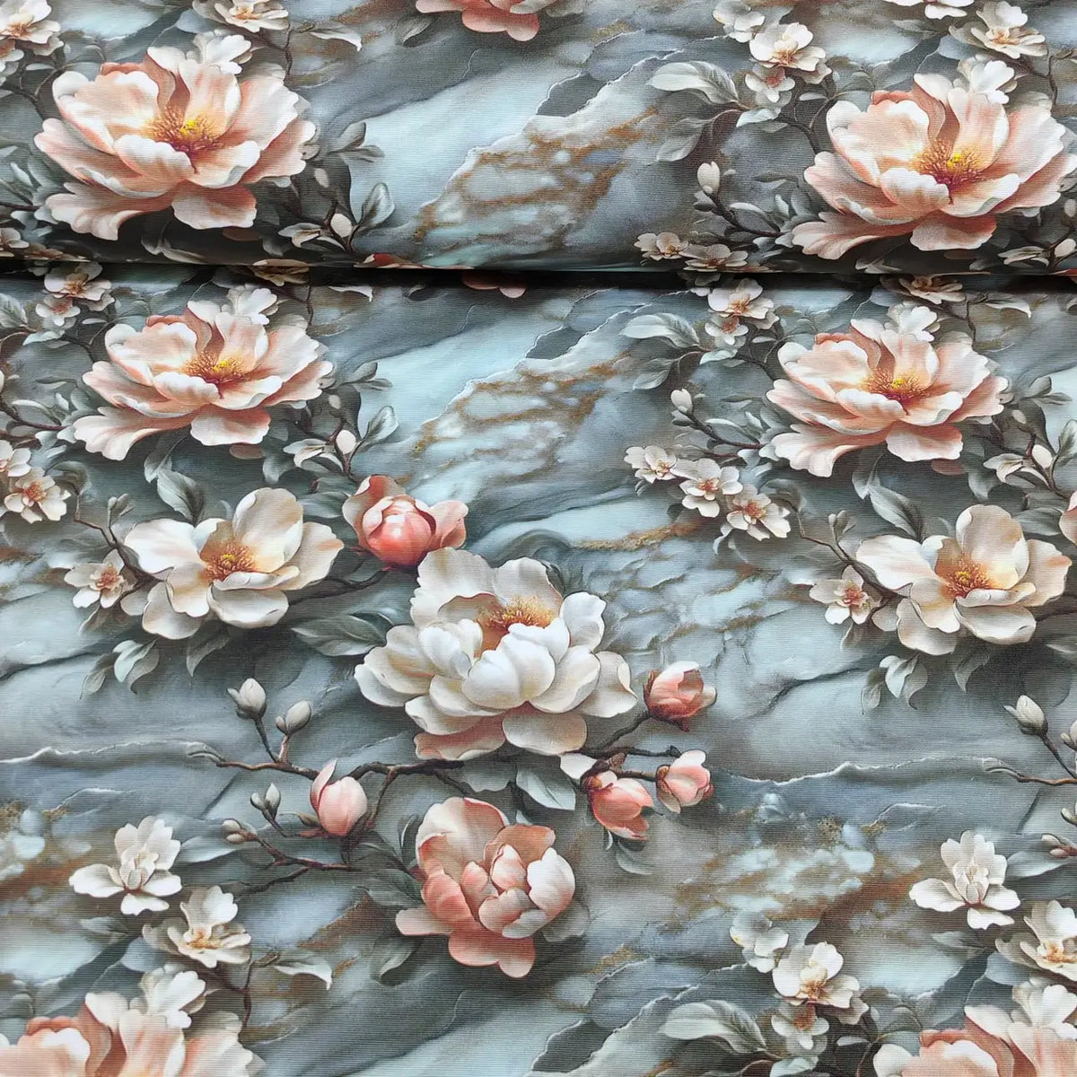 Peach pink magnolia patterned upholstery curtain fabric on blue grey marble background.