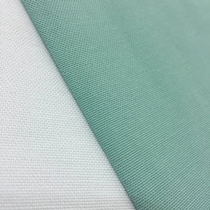 Mint green cotton canvas fabric ideal for upholstery, curtains, dining chairs, cushions, bags and home décor sewing projects.