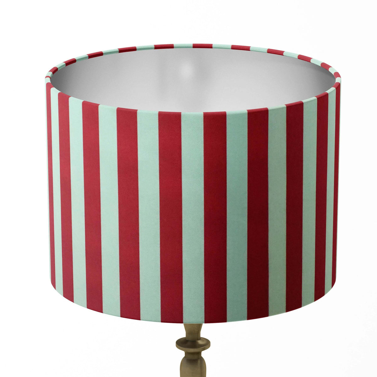 Thin stripe lampshade with red and white vertical stripes on a white background.